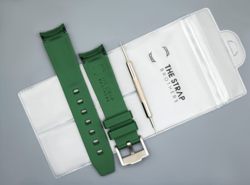 Back of the Green MoonSwatch strap and packaging of The Strap Brothers