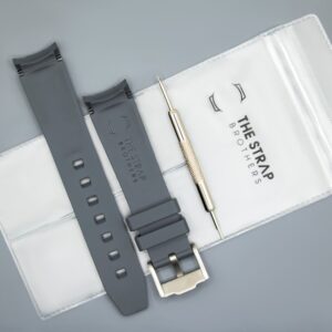 Back of the Gray MoonSwatch strap and packaging of The Strap Brothers