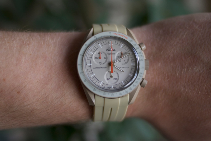 front view moonswatch jupiter with beige strap