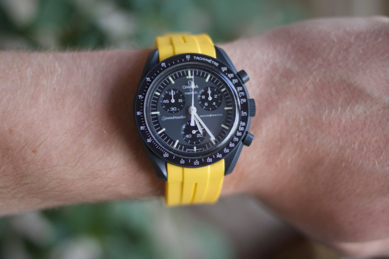 front view moonswatch mercury with yellow strap