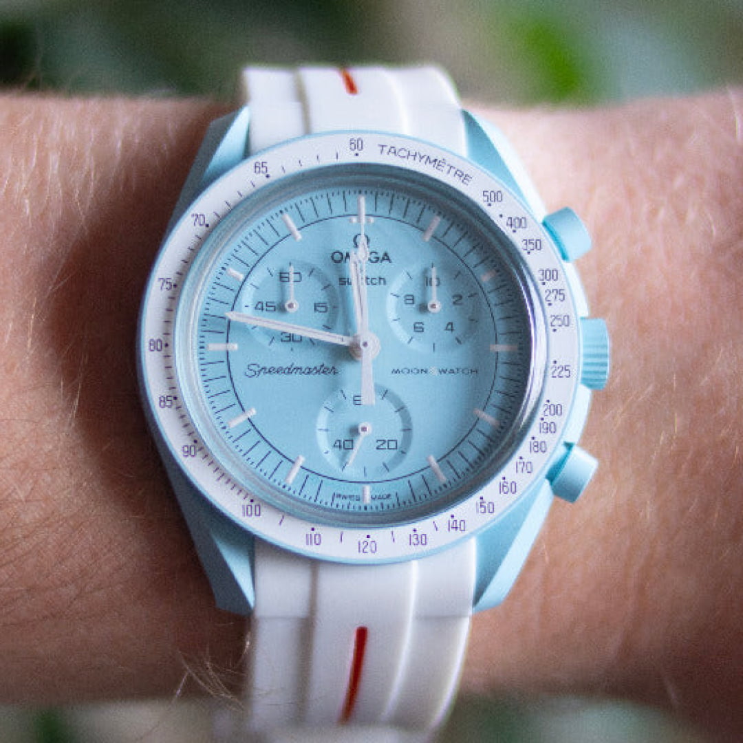 MoonSwatch uranus with white replacement strap