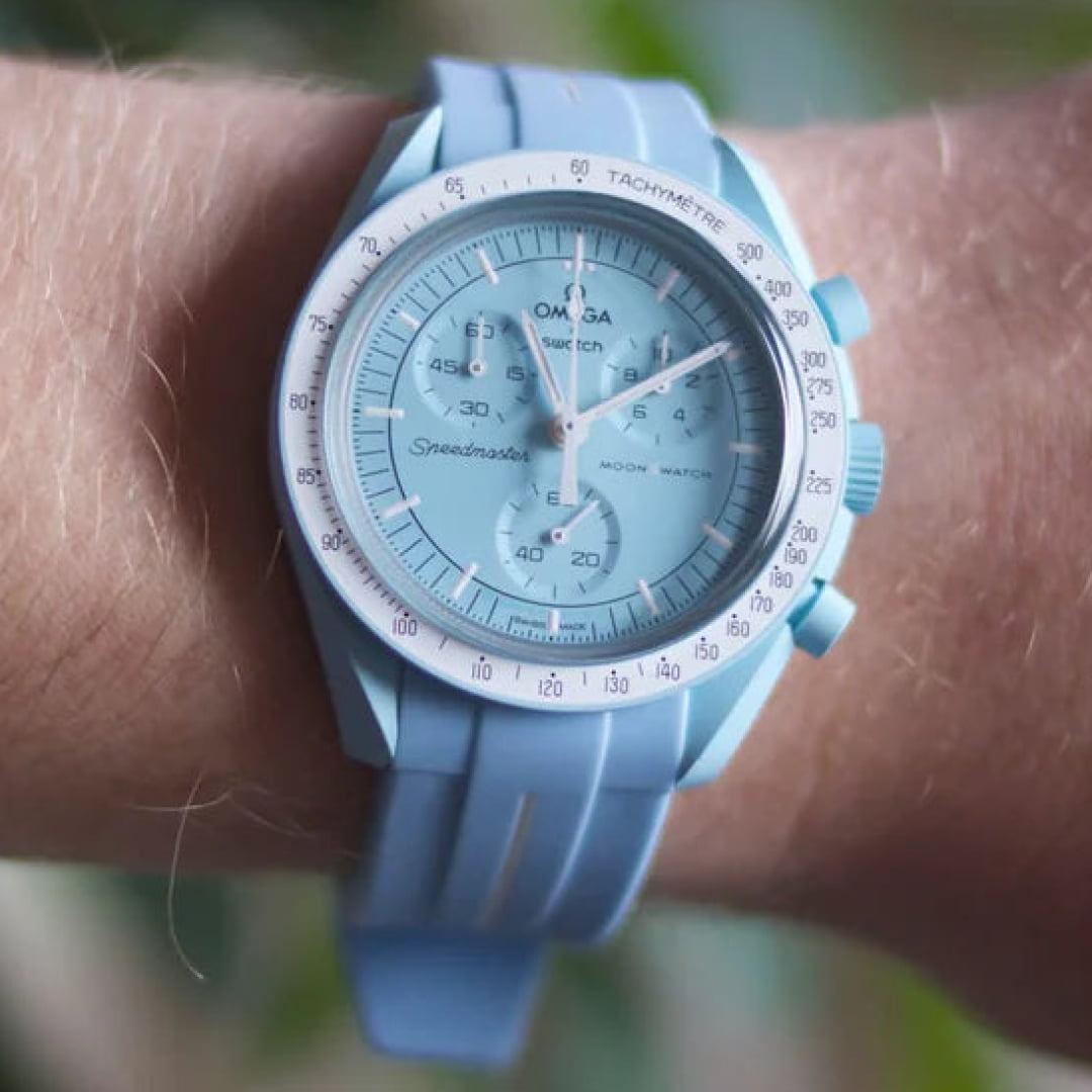 MoonSwatch uranus with blue replacement strap