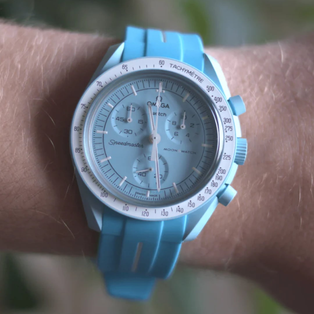 moonswatch uranus with blue replacement strap