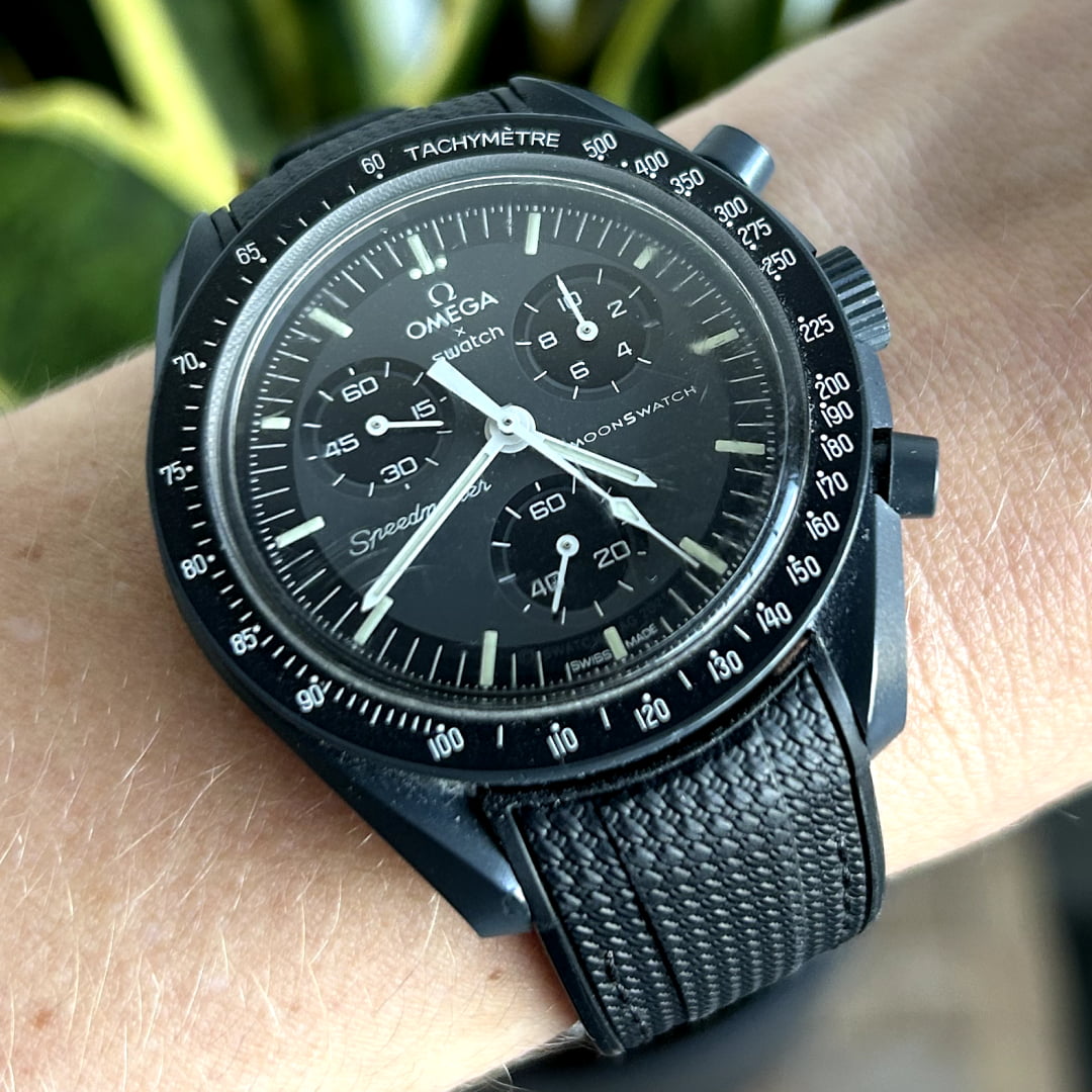 MoonSwatch mercury with black replacement strap