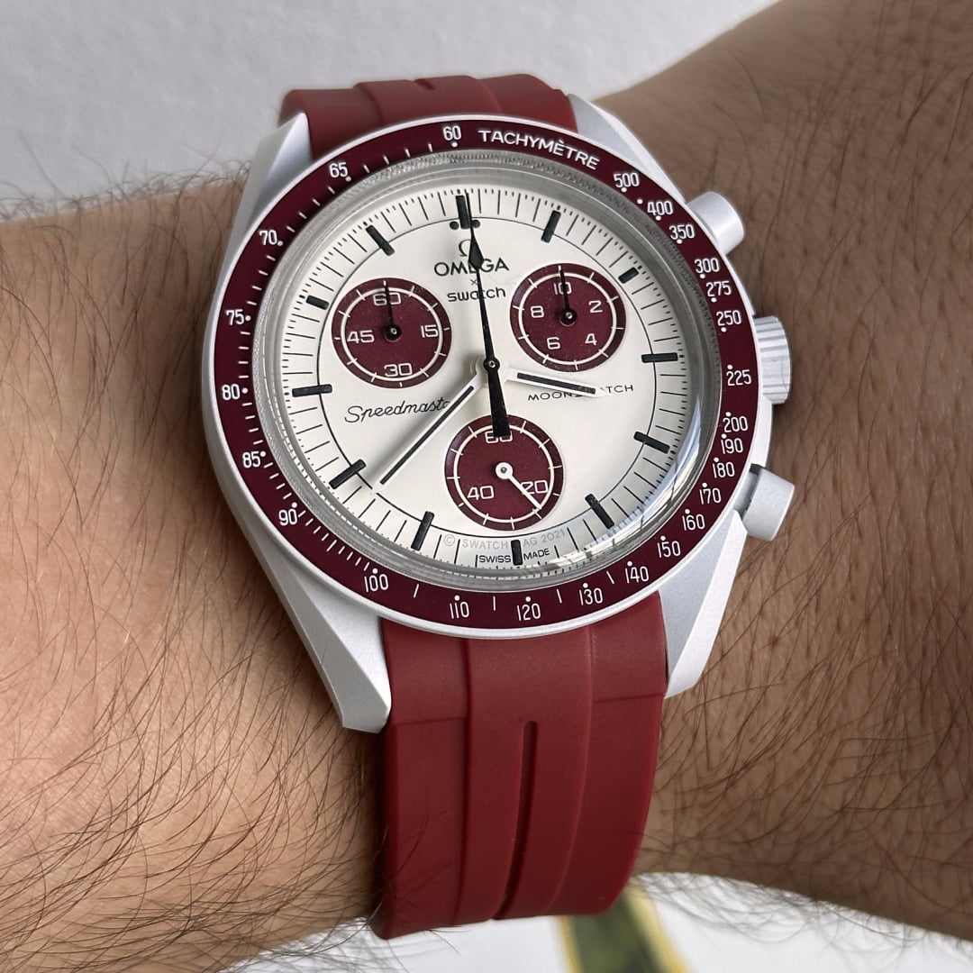 MoonSwatch pluto with red replacement strap