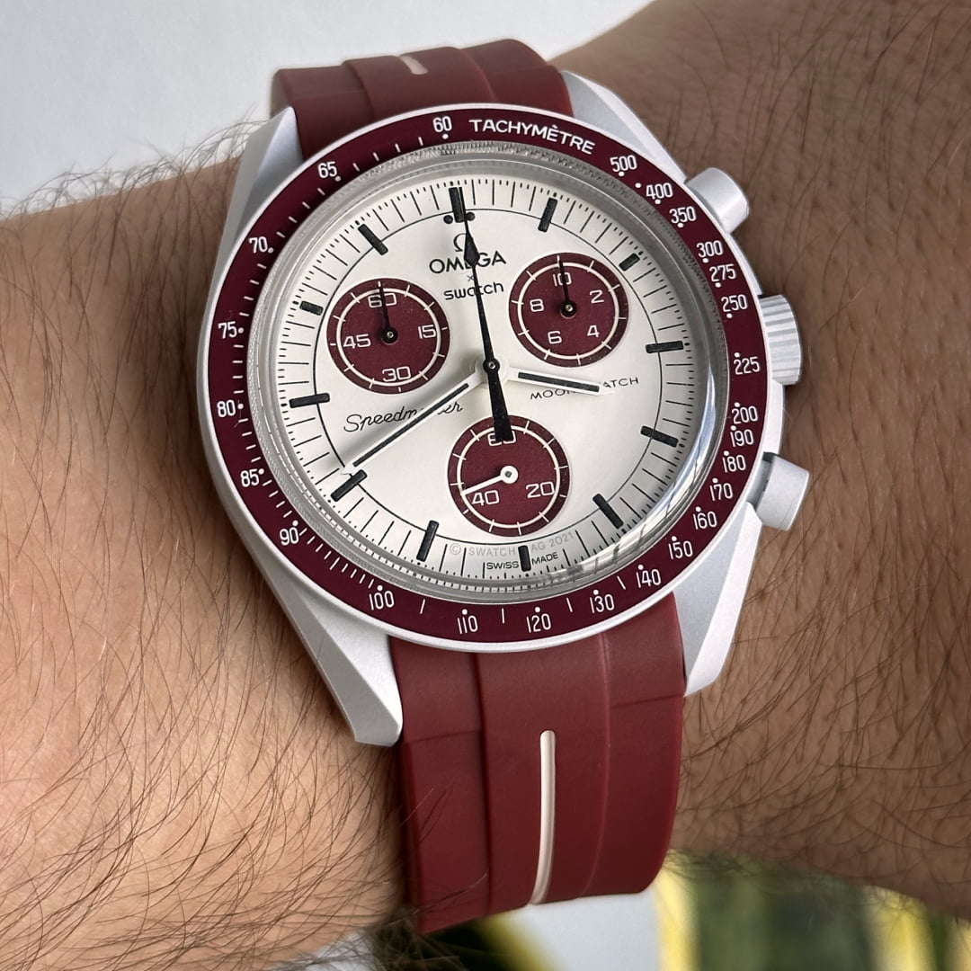 MoonSwatch pluto with red replacement strap